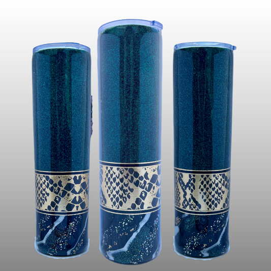 32oz tumbler, with a very dark green all over the cup and a stripe of snake skin in gold gives this tumbler a classy design.  This image shows three designs.