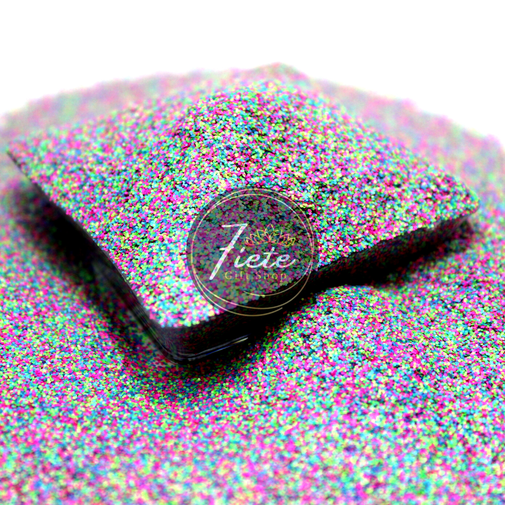 Close-up of a glittery, iridescent product labeled 'That's So 80's' with a colorful, sparkling surface that reflects a spectrum of hues